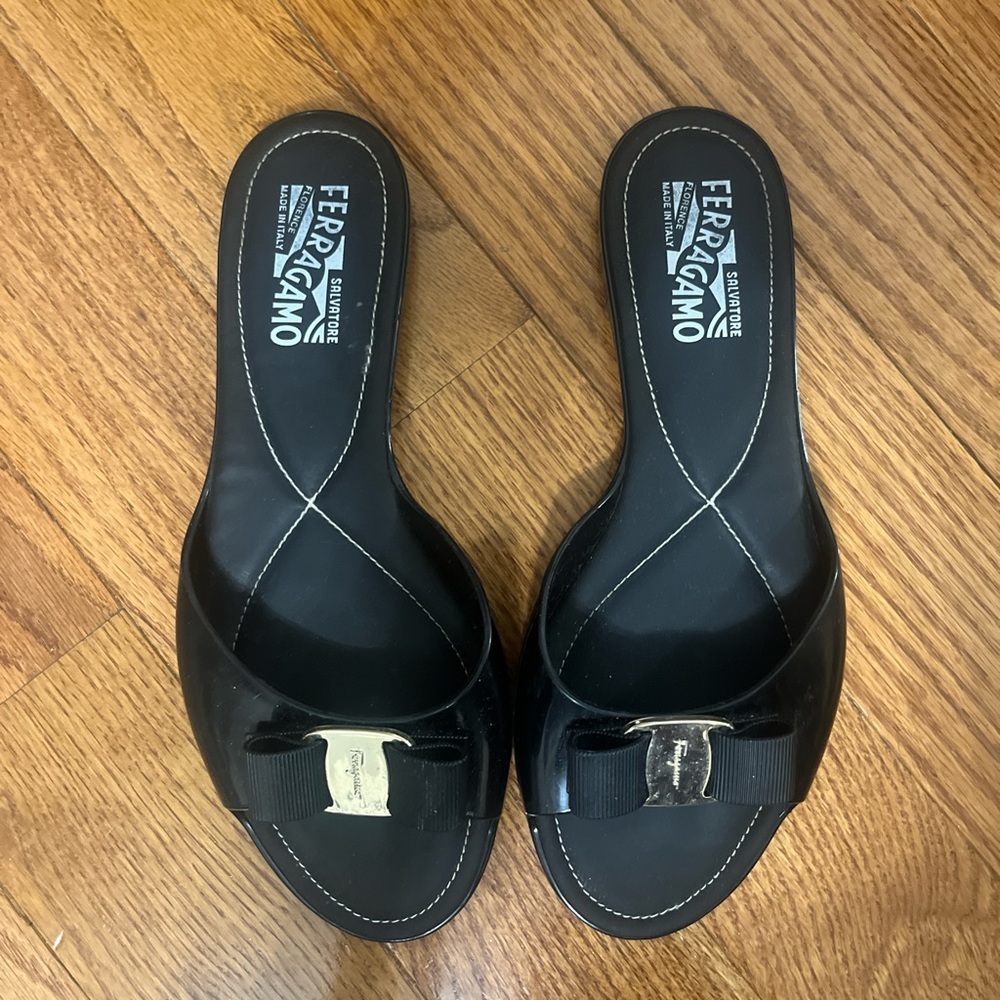 Salvatore Ferragamo “Cirella” Black Jelly Slides with Bow Accent